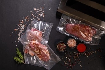 Foods being prepped for sous vide cooking.